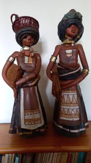 vintage handmade figurines (likely from the 1960 depict Zulu-inspired women in traditional roles