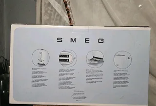 New Smeg RED Toaster never been used in the box