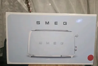 New Smeg RED Toaster never been used in the box