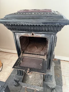 Antique wood burning stove