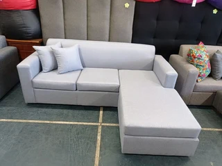 L-shaped couch (light grey) on sale