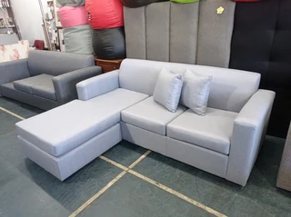 L-shaped couch (light grey) on sale