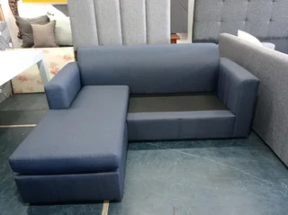 L-shaped interchangeable daybed couch navy blue.