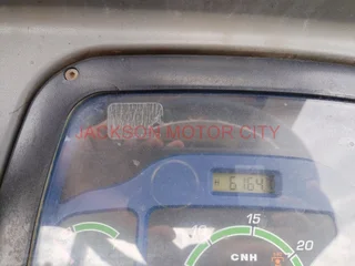 NEW HOLLAND TT75 (4X4) TRACTOR WITH LIFT ARMS AND ROOF