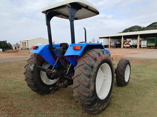 NEW HOLLAND TT75 (4X4) TRACTOR WITH LIFT ARMS AND ROOF