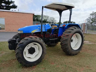 NEW HOLLAND TT75 (4X4) TRACTOR WITH LIFT ARMS AND ROOF