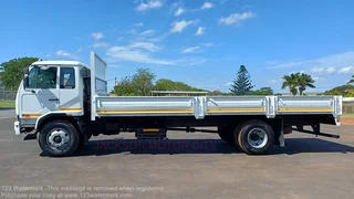 2010 - NISSAN DIESEL UD90 WITH DROPSIDE BODY