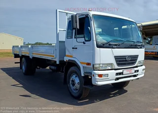 2010 - NISSAN DIESEL UD90 WITH DROPSIDE BODY