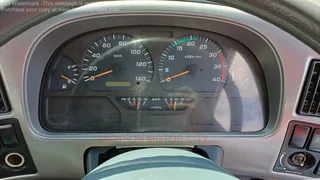 2010 - NISSAN DIESEL UD90 WITH DROPSIDE BODY