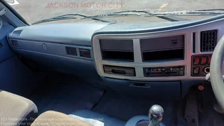 2010 - NISSAN DIESEL UD90 WITH DROPSIDE BODY