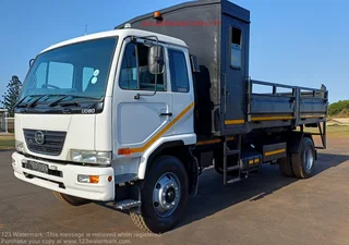 2011 - NISSAN DIESEL UD80 WITH DROPSIDE TIPPER BODY AND CREW CAB
