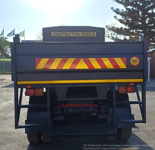 2011 - NISSAN DIESEL UD80 WITH DROPSIDE TIPPER BODY AND CREW CAB