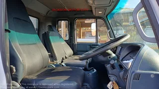 2011 - NISSAN DIESEL UD80 WITH DROPSIDE TIPPER BODY AND CREW CAB