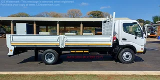 2011 - HINO 300_814 WITH DROPSIDE BODY AND TOWBAR
