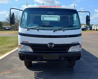 2011 - HINO 300_814 WITH DROPSIDE BODY AND TOWBAR