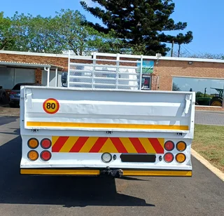 2011 - HINO 300_814 WITH DROPSIDE BODY AND TOWBAR