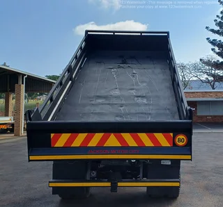 2013 - UD TRUCKS_UD80 WITH DROPSIDE TIPPER BODY AND FASSI F65 CRANE