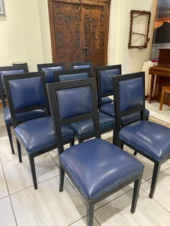 Eight comfortable dining chairs