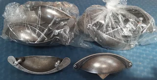 Metal drawer handles.