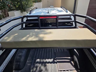 Navara cattle rails and bench seat