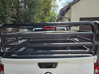Navara cattle rails and bench seat