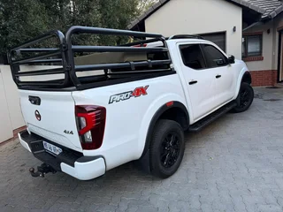 Navara cattle rails and bench seat