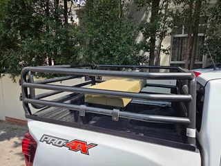 Navara cattle rails and bench seat