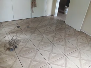 I do bricklaying,plastering,tiling,painting,paving