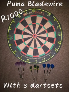 Dartboard and 3 sets included. Also selling beautiful tungsten sets at awesome prices.