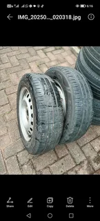 Spare rim with new tyre, check listing