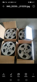 Spare rim with new tyre, check listing