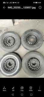 Spare rim with new tyre, check listing