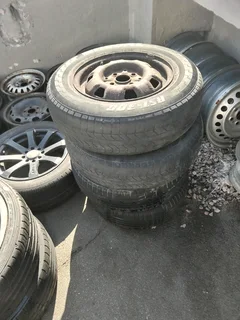 Spare rim with new tyre, check listing
