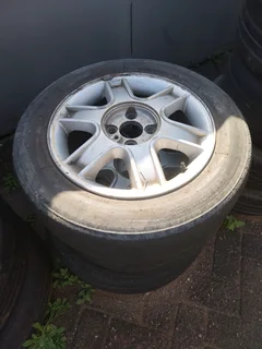 Spare rim with new tyre, check listing