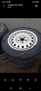 15inch Suzuki etriga rim with new 185/65/15