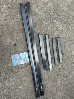 BMW E36 M3 2 Door Side Beading set Used Oem