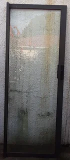 Alluminium Panel with Glass and Handle. In very good condition. R1000. I am in Orange Grove.