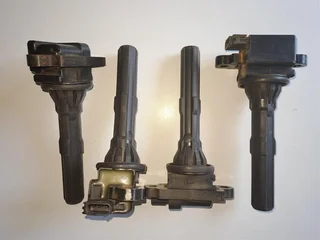 Ignition coil 90048-52130. Set of 4. Used ones. In working condition. You are welcome to test them.