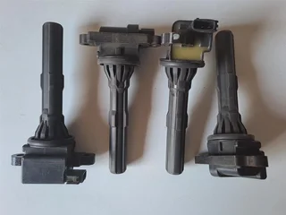 Ignition coil 90048-52130. Set of 4. Used ones. In working condition. You are welcome to test them.