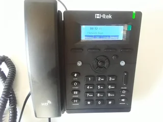 Htek UC902 VoIP phone for making calls over the Internet. Brand new in a box.