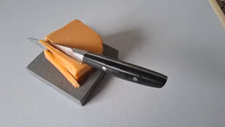 Cheese cutting board. Size small. Made of natural stone. Plenty to choose from.