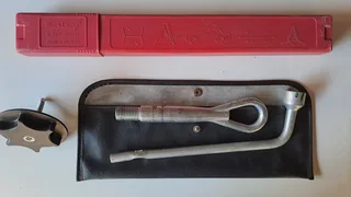 Datsun Go Accessories.Original. All brand new:Triangle for Emergency.Tyre Spanner.Towing hook. Lock