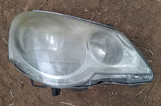 Headlight For VW Polo RHS. Used one. Fair condition.