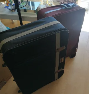 2 x Suitcases R 550 for the lot!
