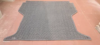 Bakkie Bt 50 weaved thick rubber bin mat. Top condition. You don't find them any more.