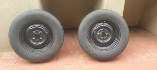 Wheels X 2. 4 lug. Rums in good condition. Tyre's not good. 165/80/R13