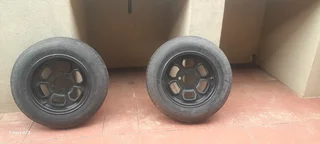 Wheels X 2.  5 lug 155/80/R13Black Rums excellent condition. Tyre & rums as good as new.