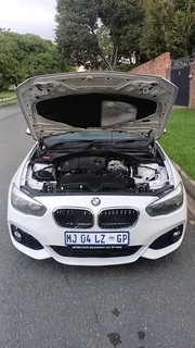 2015 BMW 118i (F20 LCI) Sport Line 5-door hatchback.Black cloth seatSpare wheelJackFactory fitted Ac