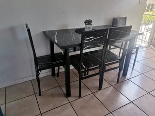 4 seater table and chairs