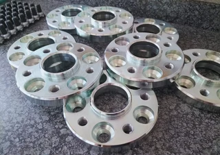 Wheel spacers and wheel adapters